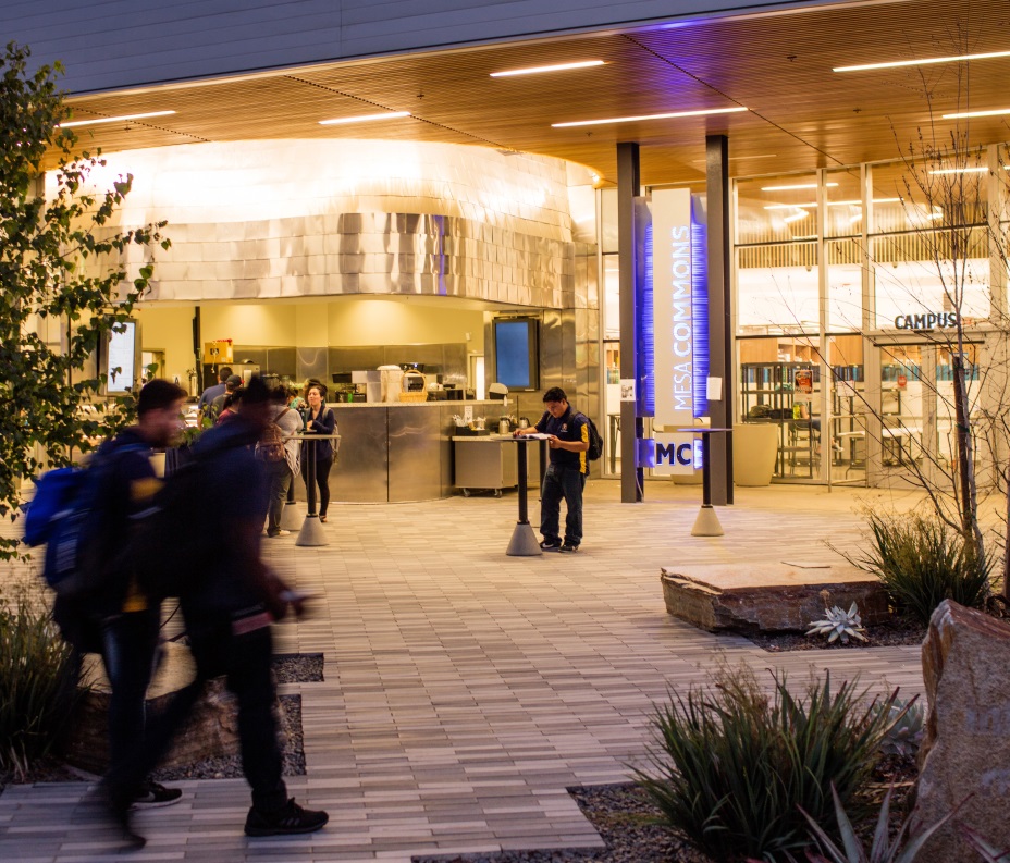 Mesa Commons lit up at night.