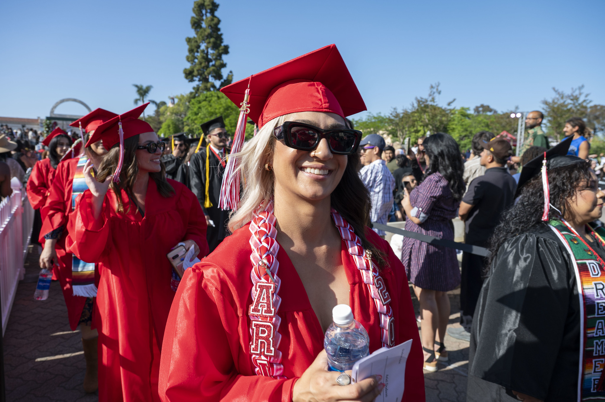 
Graduates line up to receive their diplomas.

