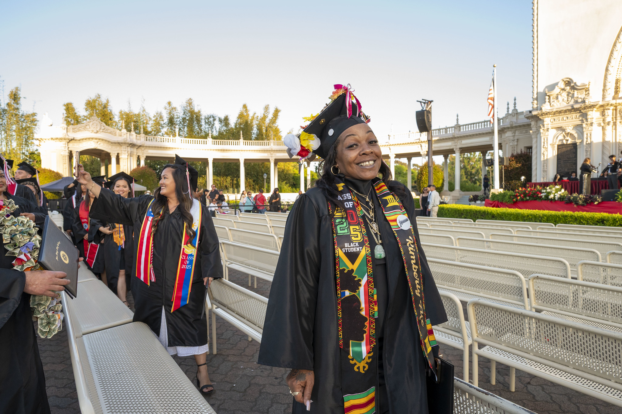 
A graduate heading back to her seat after picking up her diploma.
