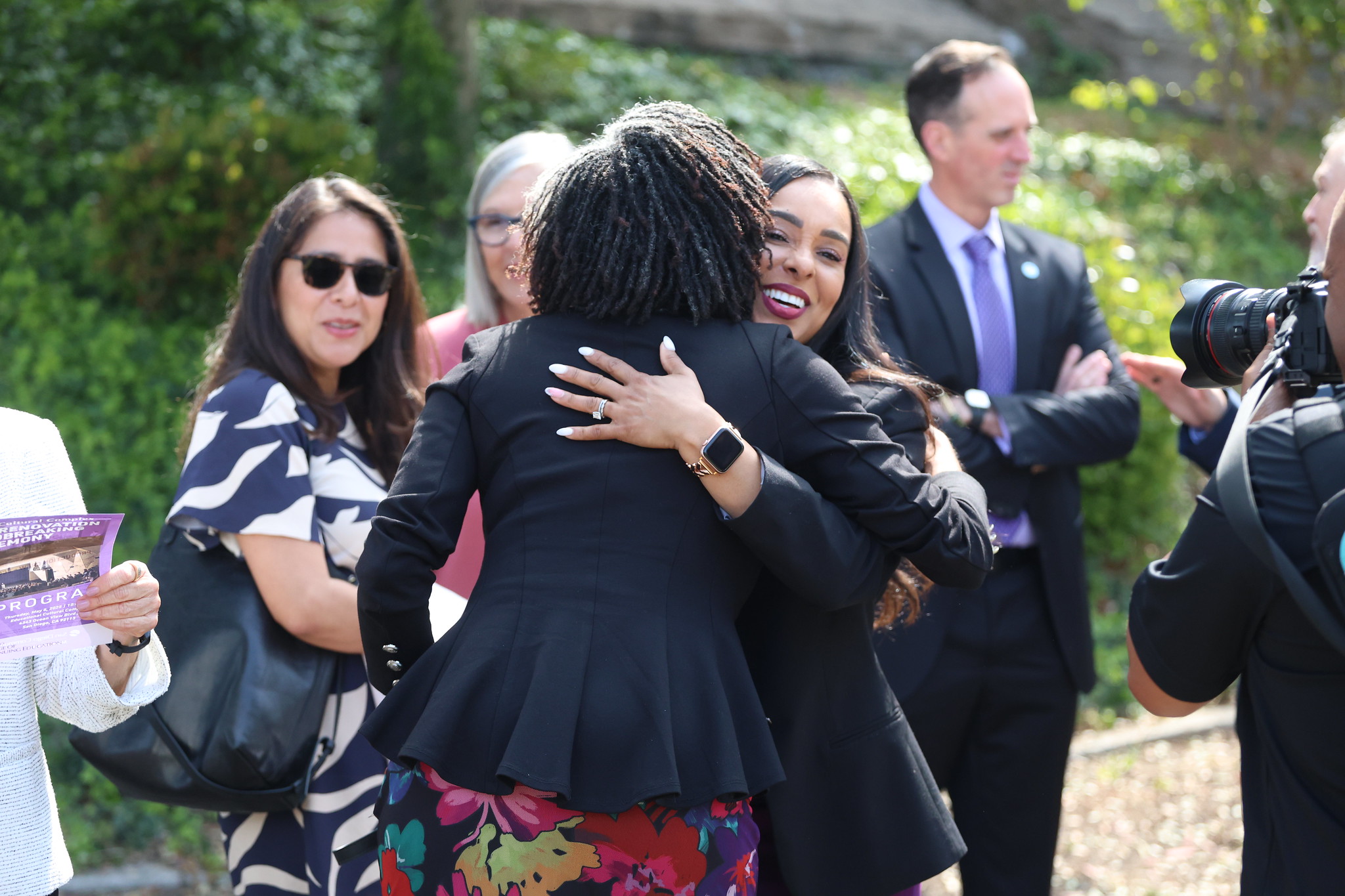
Tina King hugging someone at the event.
