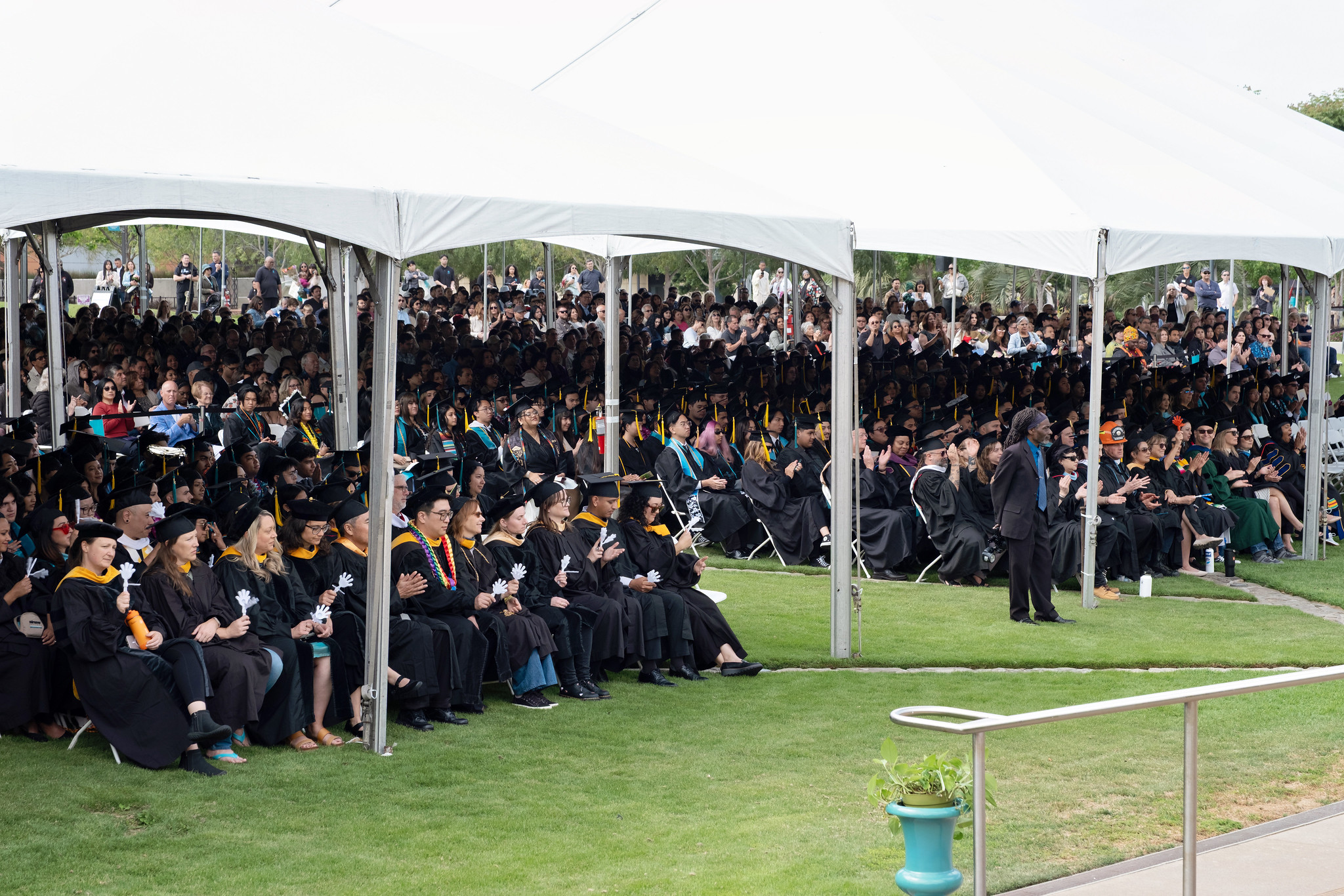 
Over 500 students seated under canopies at the Miramar College commencement ceremony.
